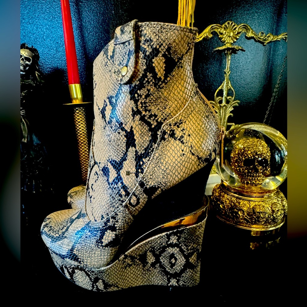 Snakeskin ankle heeled boots